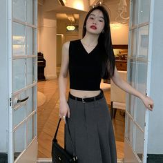 5ft 4''(166cm) tall, 95 lbs(43kg) weight and wearing a size S164cm/49kg wearing a size S - BLACK- Knit- V-neck- Sleeveless- Crop style Black V-neck Vest For Winter, Casual Black V-neck Sweater Vest, Crop Vest, Crop Style, Cropped Vest, Cropped Style, Lunar New, Black Knit, V Neck