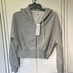 Gray. Soft. New With Tags. Bought For Christmas And Never Worn. Long Sleeve. Zipper Front. Hooded. Urban Outfitters Cotton Hoodie Sweatshirt, Urban Outfitters Cotton Hoodie Tops, Urban Outfitters Fall Hoodie With Drawstring Hood, Urban Outfitters Cotton Hoodie, Urban Outfitters Long Sleeve Hoodie With Drawstring, Urban Outfitters Hooded Hoodie With Drawstring, Urban Outfitters Cotton Sweatshirt For Fall, Urban Outfitters Fall Hoodie Sweatshirt, Urban Outfitters Hooded Top For Streetwear