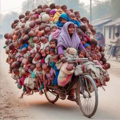 a group of people riding on the back of a bike with lots of children in it