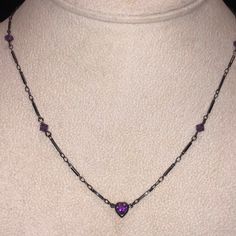 This Wonderfully Understated Beauty Features A Petite Amethyst Crystal Heart And Some Amethyst Crystal Stations Along A Gunmetal Chain. Designer Marked Metal Tag 16” 2n Box Elegant Purple Metal Necklace, Gothic Purple Necklace For Party, Purple Gothic Necklace For Party, Beauty Features, Metal Tag, Metal Tags, Crystal Heart, Amethyst Crystal, Earings Piercings