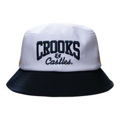 Top off your look with the exclusive Crooks & Castles x Corona Bucket Hat! This hat brings together streetwear flair and beach vibes, making it the perfect accessory for any occasion. Design & Features: Color: Crisp white with navy detailing for a clean, versatile look. Fabric: Crafted from 100% polyester twill, ensuring durability and comfort. Details: Embroidered logos on the front and back Stylish crown and brim stitching Interior taping for added comfort Navy and gold embroidery for a touch of elegance Dimensions: Brim: 2 1/8” height Crown: 3 3/8” height Top Crown: 6.5” height Whether you're hitting the beach, going to a festival, or just hanging out, this bucket hat is your go-to for a cool, laid-back style. Stay shaded and stylish with this must-have piece from the Crooks & Castles x Bucket Hat White, Crooks And Castles, Gold Embroidery, Beach Vibes, Laid Back Style, Beach Vibe, Hanging Out, Design Features, Bucket Hat