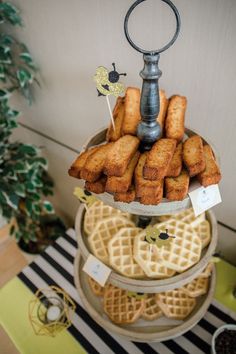 there are waffles stacked on top of each other in the shape of bees