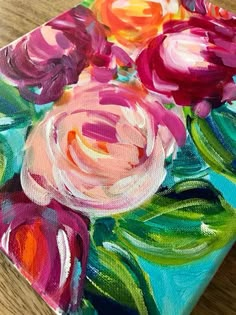 an oil painting of flowers on a canvas