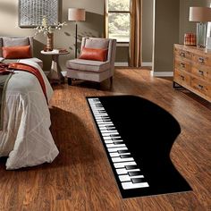 a bed room with a piano rug on the floor