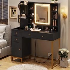 a desk with a mirror and lights on it