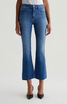 A faded wash and raw hems bring cool, casual appeal to mid-rise cropped bootcut jeans cut from comfortable cotton-blend stretch denim. 27" inseam; 16" leg opening; 10 1/2" front rise; 14" back rise (size 29) Zip fly with button closure Five-pocket style 98% cotton, 2% elastane Machine wash, tumble dry Imported Cropped Bootcut Jeans, Favorite Daughter, Maternity Shops, Designer Clothes For Men, Modern Outfits, Comfortable Dress, Toddler Girl Outfits, Fashion Help, Women's Summer Fashion