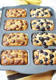 muffins with chocolate chips and blueberries in a pan