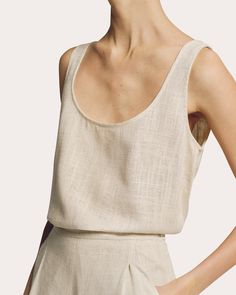 An elevated basic, this scoop neck tank top is crafted from a neutral-hued linen-viscose blend. Pair with Sophie et Violà's Linen Wide-Leg Pants in Sand for monochromatic styling.Pull-on70% linen, 30% viscoseDry cleanMade in Spain Size & Fit Please note, below measurements reflect Sophie et Violà's size chart, not the actual garment. Size XS (US 2): 31.49in bust, 23.62in waist, 34.64in hips Size S (US 4): 33.07in bust, 25.19in waist, 36.22in hips Size M (US 6): 34.64in bust, 26.77in waist, 37.79 Sleeveless Linen Shirt, Linen Fashion, Linen Tank Top, Linen Tank, Scoop Neck Tank Top, Wide Leg Linen Pants, 2024 Trends, Minimalist Style, Black Tank Tops