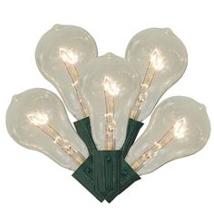 a bunch of light bulbs on top of a green wall mounted light fixture with filament bulbs