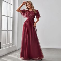 Featuring a classic round neckline, short ruffle sleeves and a belt design in the waist, this prom dresses with sleeves is perfect for any special occasions. This maxi prom dress with flowy tulle skirt will make you comfortable when wearing it at your prom night. The shimmery leave design also gives a romantic vibe.Perfect as wedding guest dress, formal dress, bridesmaid dress, evening dress, prom dress, party dress, homecoming dress, cocktail dress, ball gowns, causal dress, banquet dress, mili Short Sleeve Bridesmaid Dress, Robes D'occasion, Sequin Evening Gowns, Sleeve Embroidery, Evening Dress Floor Length, Dresses Formal Elegant, Ever Pretty, Maxi Dress Prom