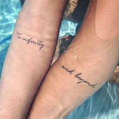 two people sitting next to each other with tattoos on their legs that say, together and never