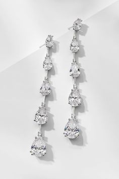 Introduce glamour to your look with these multi-CZ earrings. The graduated pear-shaped stones create a dazzling display that will draw the eye and sparkle with every movement. Wedding Earrings Bride, Diamond Earrings Wedding, Teardrop Diamond, Bride Earrings, Diamond Dangle Earrings, Modern Love, Cz Earrings, Fine Jewellery Earrings, Wedding Earrings