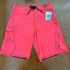 Billabong Recycler Men’s 31 Recycler All Day Px3 Board Shorts Red Swim Trunks Spandex Very Stretchy New Platinum Stretch Athletes Choice Recycled Material Perfect For Lifeguards Solid Neo Red Pocket With Stretch Rope Hook To Attach Valuables To Velcro Closure Pink Bottoms With Built-in Shorts For Outdoor, Functional Breathable Red Bottoms, Functional Red Breathable Bottoms, Red Surfing Shorts, Functional Red Short Bottoms, Casual Fitted Red Swim Trunks, Red Fitted Casual Swim Trunks, Fitted Red Casual Swim Trunks, Casual Red Breathable Bottoms