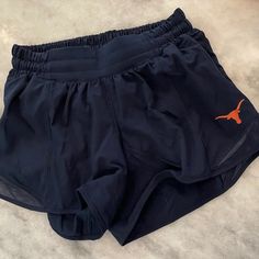 Navy Blue Lululemon Shorts With Orange Longhorn Logo Size 4 4” Never Worn And In Very Good Condition Penn State Lululemon, Blue Lululemon Shorts, Blue Lululemon, Shorts Lululemon, Lululemon Shorts, Penn State, Fashion Fits, Shorts Athletic, Athletic Shorts