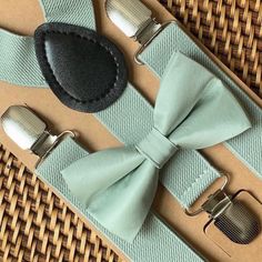 Your special guy will look so handsome when he shows up wearing this sage green bow tie and sage suspenders! This bow tie & suspenders set is a great choice for family photos, wedding, ring bearer outfit, birthday celebration or any other special occasion. ❤ **Please Specify** Bow Tie Only (w/ Clip or Neck Strap), Suspenders Only, or Bow Tie Only & Susp (Bow Tie and Suspenders) SUSPENDERS- One Pair of our Quality Suspenders BOW TIE - One Bow Tie on White Adjustable STRAP or Alligator CLI Sage Green Suspenders Wedding, Sage Suspenders Wedding, Sage Green Bow Tie And Suspenders, Green Bow Tie And Suspenders, Sage Bow Tie, Sage Green Bow Tie, Wedding Ring Bearer Outfit, Tie And Suspenders, Green Weddings