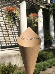 there is a paper cone that has been placed on the post