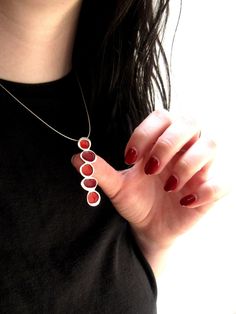 "This necklace uses stacked rocks as an inspiration for its rounded, organic forms. The pendent is handmade using solid sterling silver and enamel and is 2\" tall, hangs from a modern 16\", 18\", or 20\" nylon coated stainless steel cord with a sterling spring ring clasp. Model photo shows a different color option and is for size reference only. This listing is for the light blues version. You can see the matching earrings here: https://www.etsy.com/listing/266025576/pebble-earrings-in-shades-of Red Enamel Jewelry With Large Pendant, Minimalist Silver Enamel Jewelry, Enamel Large Pendant Jewelry, Enamel Oval Pendant Jewelry, Enamel Oval Pendant Jewelry With Large Pendant, Enamel Jewelry With Large Oval Pendant, Modern Handmade Enamel Jewelry, Modern Nickel-free Enamel Jewelry, Modern Silver Enamel Necklace