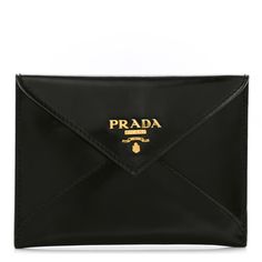 This is an authenticPRADA Saffiano Metal Envelope Compact Wallet in Black. This is a chic clutch wallet that is finely crafted of cross-grain textured saffiano leather in black.  The front flap unsnaps to a leather interior to store bills and acheckbook. Pop Stitch, Prada Saffiano, Compact Wallet, Prada Wallet, Leather Interior, Clutch Wallet, Card Sizes, Prada, Grain