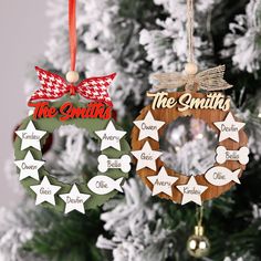 two christmas ornaments hanging from a tree with the names of each ornament on it