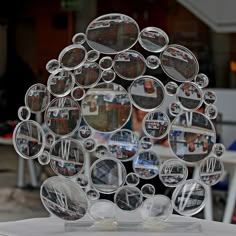 a glass sculpture with many different images on it