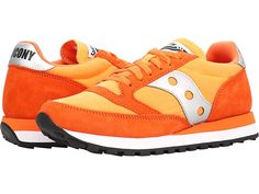 Saucony Originals Jazz 81 - Shoes : Orange : A return of an icon is shown in the Saucony Originals Jazz 81. This legendary footwear was recreated with a few upgrades to keep it's place in history. Step in style as this material provides security and comfort. Molded EVA sole that is soft but durable. Branding on tongue and heel counter. Premium Wolverine suede overlay. Upgraded full-cushion sockliner. Leather and textile upper. Textile lining and insole. Blown rubber outsole. Mesh underlays. Doub Comfortable Orange Sneakers For Streetwear, Orange Sneakers With Removable Insole And Round Toe, Retro Running Shoes With Cushioned Footbed And Round Toe, Retro Running Shoes With Rubber Sole And Round Toe, Orange Low-top Sneakers With Removable Insole, Sporty Orange Sneakers With Removable Insole, Comfortable Low-top Orange Sneakers, Comfortable Orange Low-top Sneakers, Shoes Orange