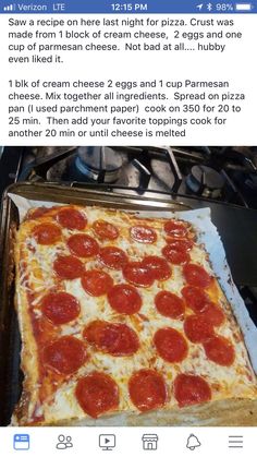 a pizza sitting on top of a pan covered in cheese and pepperoni