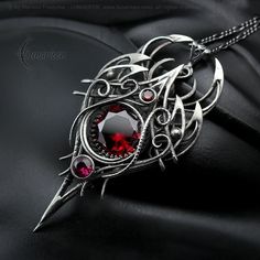 XYRNFNER - Exclusive, Large, Gothic, Fantasy-style necklace. Fully handmade work (wire-wrapping technique with oxidizing and polished silver). Main base gem: Red Garnet Cubic Zirconia. Additional stones: Cubic Zirconia. Material: silver (Sterling Silver, Fine Silver / 925, 999). We use only high-quality silver. No "German Silver" - our silver does not contain harmful nickel. Optional: Sterling Silver Chain, length: 42 cm + 7 cm, or 52 cm + 7 cm (Figaro) with a decorative clasp, adjustable. Penda Wire Wrapping Techniques, Witchy Jewelry, German Silver, Gothic Style, Style Necklace, Red Garnet, Elegant Gift, Gothic Fashion, Fine Silver