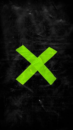 a black background with a green x on it