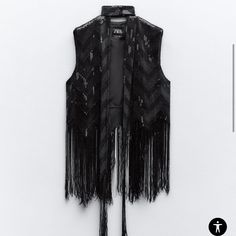 Nwt. In Perfect New Condition. Size Is Xs-S On The Tag. No Closure, Open Front Vest. Very Well Made Vest With Sequins And Fringe. Scarf Is Included. Black. 93% Polyester 7% Elastane.Fringed Hem. Lining 100% Polyester. Vest 20” And Fringe 11”. The Zara Model Is Wearing Matching Skirt. I Couldn’t Get It. Vest Is Not Long Like It Shows In The Picture. No Trades. Black Winter Vest For Night Out, Black Vest For Night Out In Fall, Chic Vest For Fall Party, Fitted Black Sequined Vest, Black Party Vest For Fall, Black Fall Party Vest, Zara Black Vest For Spring, Zara Fitted Vest For Winter, Zara Fitted Winter Vest