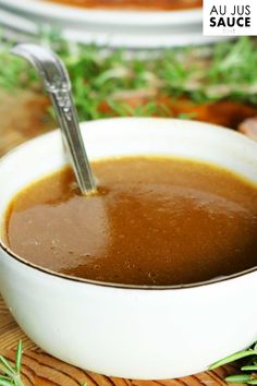 a bowl of soup with a spoon in it