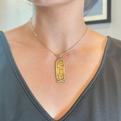 This is part of Chairish’s Fine Jewelry assortment.  A fine 10K Gold Cartouche pendant with Egyptian Hieroglypics. The pendant tests 10K Gold. It has a faint trace of a mark on the bale, but it tests 10K. Condition is excellent.  Dimensions: Length with bale: 1 7/8", Width: 9/16", Weight: 5 grams Egyptian Hieroglyphics, 10k Gold, Men's Style, Fine Jewelry, Fashion Outfits, Pendant, Gold