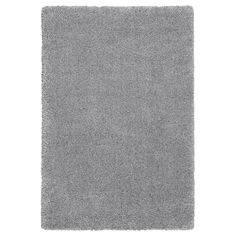 a gray rug on a white background with no one in the room to see it