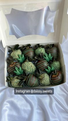 a box filled with chocolate covered strawberries