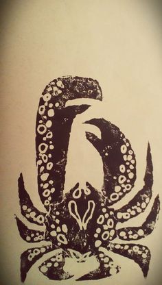 the letter c is made up of black and white images with an octopus on it