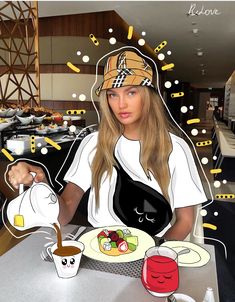 a woman sitting at a table with a plate of food in front of her