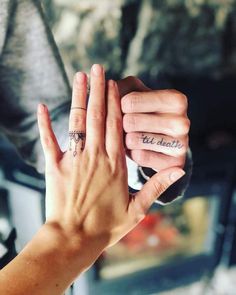 Top 59 Best Wedding Ring Tattoo Ideas - [2021 Inspiration Guide] Finger Tattoos For Women Wedding, Couple Tattoo Wedding Ring, Women Tattoo Wedding Ring, Wedding Rings Tattoo His And Hers, Women Ring Finger Tattoo, Wedding Band Tattoo For Women, Tattoo Wedding Bands Women, Tattoo Rings Wedding For Women, Tattoo Wedding Rings Women