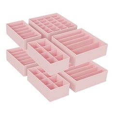 five pink drawers are stacked on top of each other