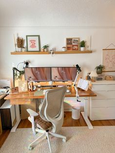 a home office with two computer desks and shelves