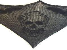 a black bandana with a skull on it