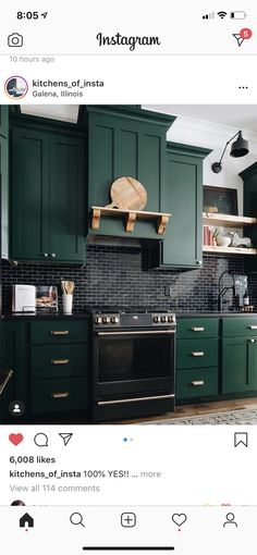 a kitchen with green cabinets and black counter tops is featured on instagram for the first time