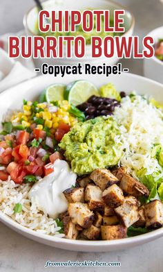 a bowl filled with chicken, rice and guacamole on top of a table