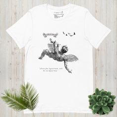 Icarus/Ancient greek mythology inspired t shirt. Since its unisex is available both for men and women and comes off perfect as a t shirt gift for greek mythology lovers! IMPORTANT:Model images are only for visual purposes only, the sleeve length may vary and may not be the same as it is on a model,the actual sleeve length is represented on flat t shirts! Comes in different colors, such as:Dark Red-Midnight Navy-Black-White-Beige. * 100% combed and ring-spun cotton (Midnight Navy contains polyest Graphic Shirts Women, Ancient Greek Mythology, Model Images, Tee Shirt Homme, Mens T Shirts, Midnight Navy, Greek Mythology, White Beige, Ancient Greek