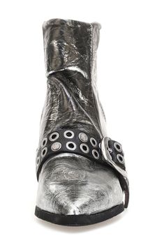 Crackled metallic leather tanned and treated by hand brings vintage-inspired beauty to a moto-style bootie refreshed with a studded buckle strap. 2 1/2" heel 4 1/4" shaft Side zip closure Cushioned insole Leather upper and lining/synthetic sole Imported Punk Leather Moto Boots With Silver Studs, Leather Moto Boots With Rivets For Festival, Silver Punk Boots With Rivets, Silver Leather Moto Boots For Fall, How To Style Wedges, Wedge Bootie, Moto Style, Metallic Leather, Bootie