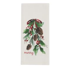 a white towel with holly and pine cones on it, hanging from a red ribbon