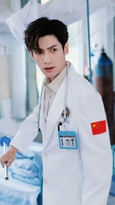 a male doctor in a white lab coat