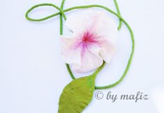 A very beautiful felted white, pink blossom as felt chain. Length with leaf = 79''. 1 x felt blossom length approx. 79 inch flower diameter ca.3,9 inch length of leaf approx. 4,3 inch 100% wool Handcrafted, new goods You can view the chain around his neck wear, but also as an ornament around the waist. A wonderful jewelry for the bride, for the holidays or for layering. Very refined affects the flower necklace as a bracelet. Your imagination knows no bounds. The long handle is lime green. The co Whimsical White Flower Necklace, White Flower Necklaces For Crafting, Pink Flower Necklace, Felt Jewelry, Pink Blossom, Layered Jewelry, Choker Necklaces, Layered Look, Flower Necklace