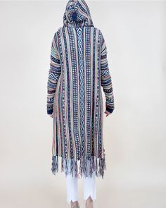 Multi-color tribal knit cardigan coat. Hooded, fringe ends, knee length. One Size. 60% Acrylic, 30% Polyester, 10% Polyamide Imported. Knit Sweater Coat, Sweater Coat, Cardigan Coat, Sweater Coats, Knit Cardigan, Knit Sweater, Dark Grey, Knitted Sweaters, Knee Length