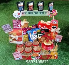 an assortment of food items displayed on grass