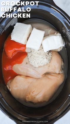 crockpot buffalo chicken is in the slow cooker and ready to be cooked