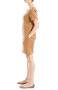 Layer and accessorize this smart shift dress however you want for a look that easily switches from the 9-to-5 to after-hours-ready in seconds. 35 1/2" length Slips on over head Crewneck Short sleeves On-seam pockets Unlined 95% polyester, 5% spandex Machine wash, line dry Imported Brown Mini Length Office Dress, Brown Mini Dress For Office, Shift Sheath Mini Dress For Workwear, Sheath Shift Mini Dress For Work, V-neck Shift Midi Dress, Chic V-neck Shift Mini Dress, Green Shift V-neck Mini Dress, V-neck Shift Shirt Dress, Solid V-neck Shift Dress